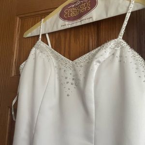 Wedding dress says 10 but im a size 3 and it fits after being altered.